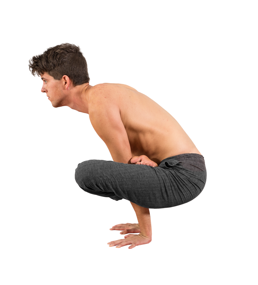 a man doing a yoga pose against a white background