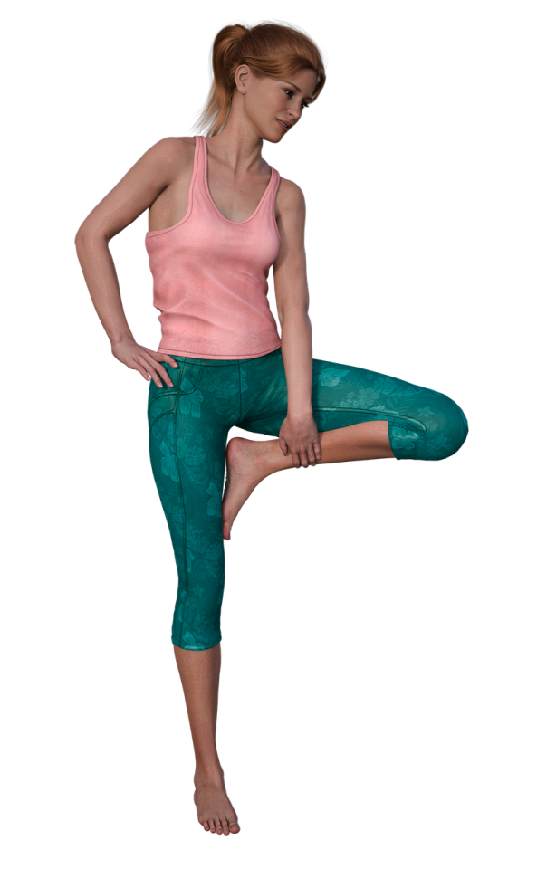 a woman in green leggings and pink tank top