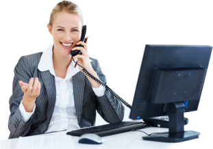 a woman sitting at her desk talking on the phone