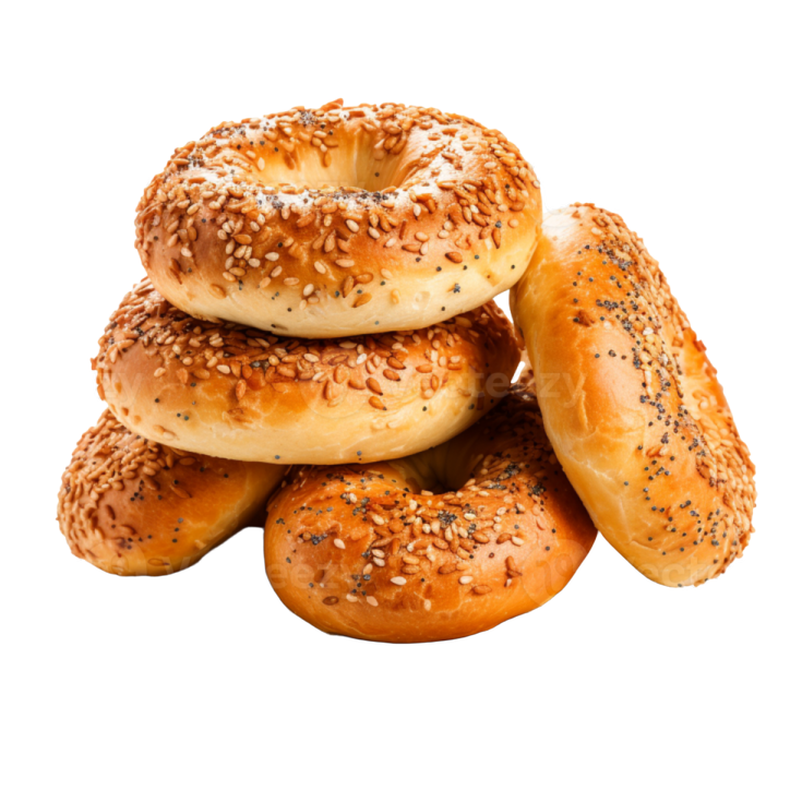 a pile of bagels on a wooden plate