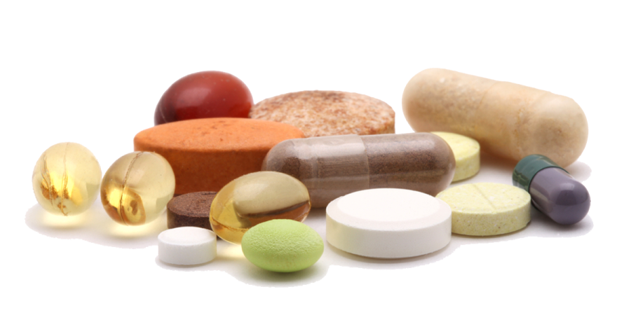 a pile of pills on a white background