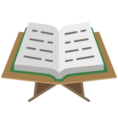 an open book on a wooden stand