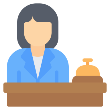 a woman sitting at a table with a tray of food