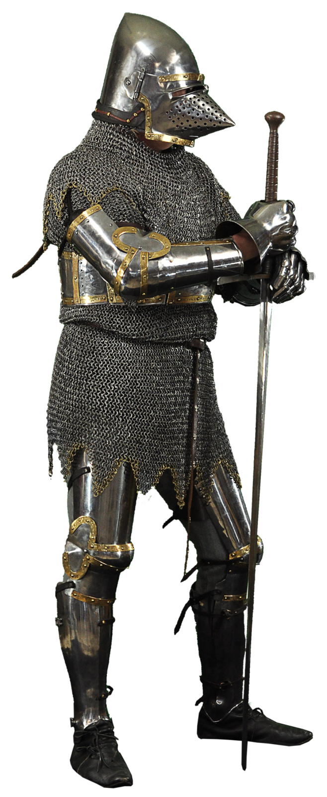 a knight in full armor holding a sword