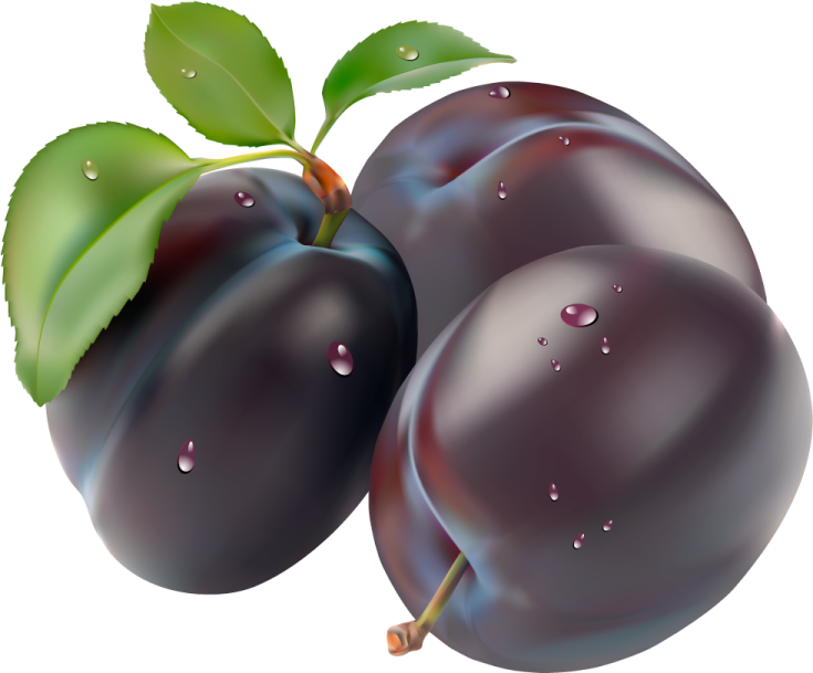 two plums with leaves and water droplets
