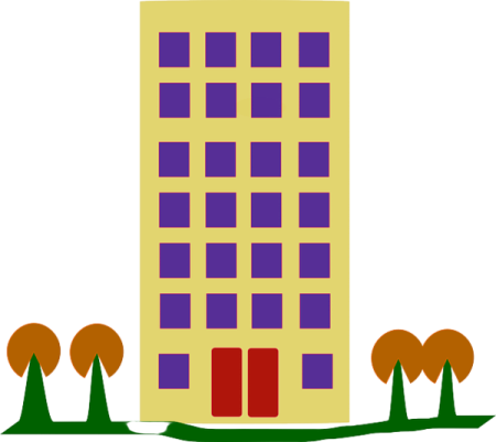 a tall building with trees in the background