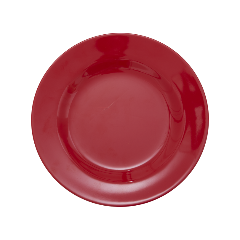 a red plate on a white background
