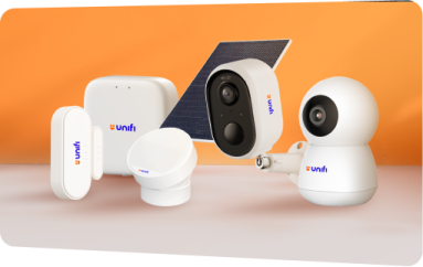a group of surveillance cameras on an orange background
