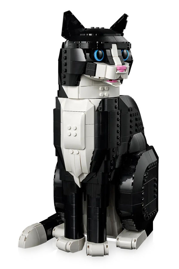 a black and white lego dog with blue eyes