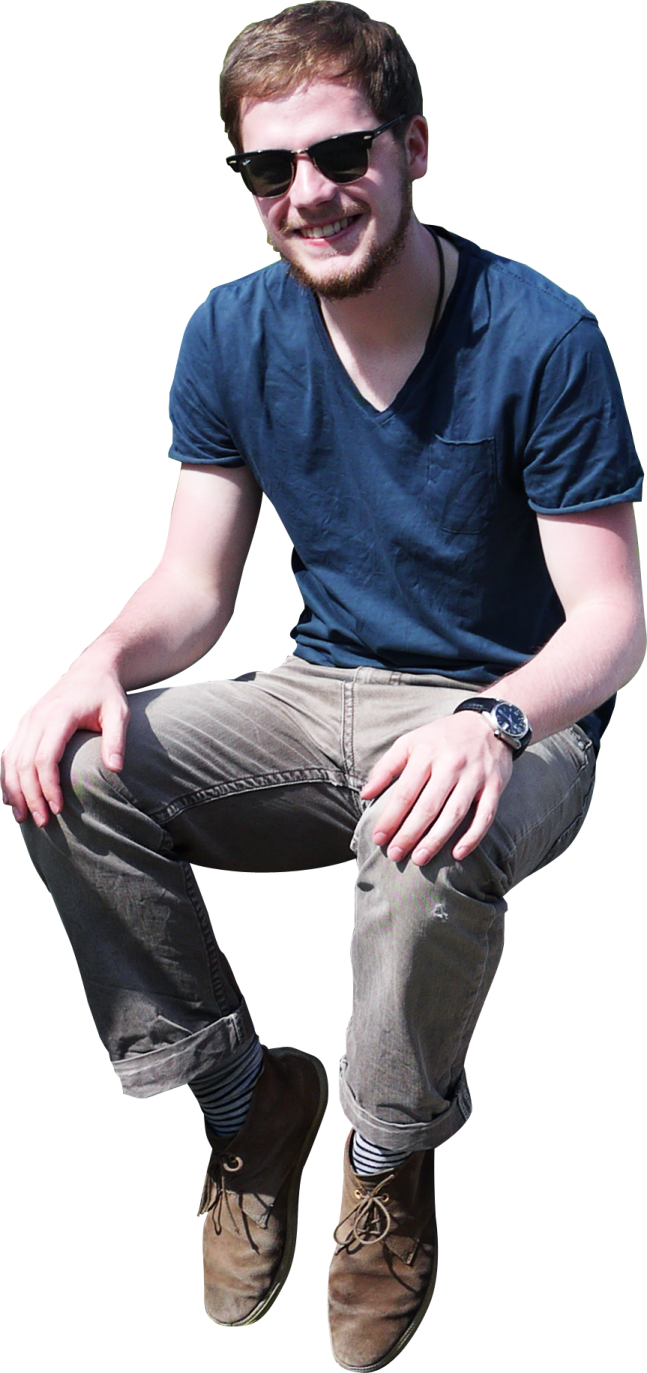 a man in a blue shirt and brown shoes