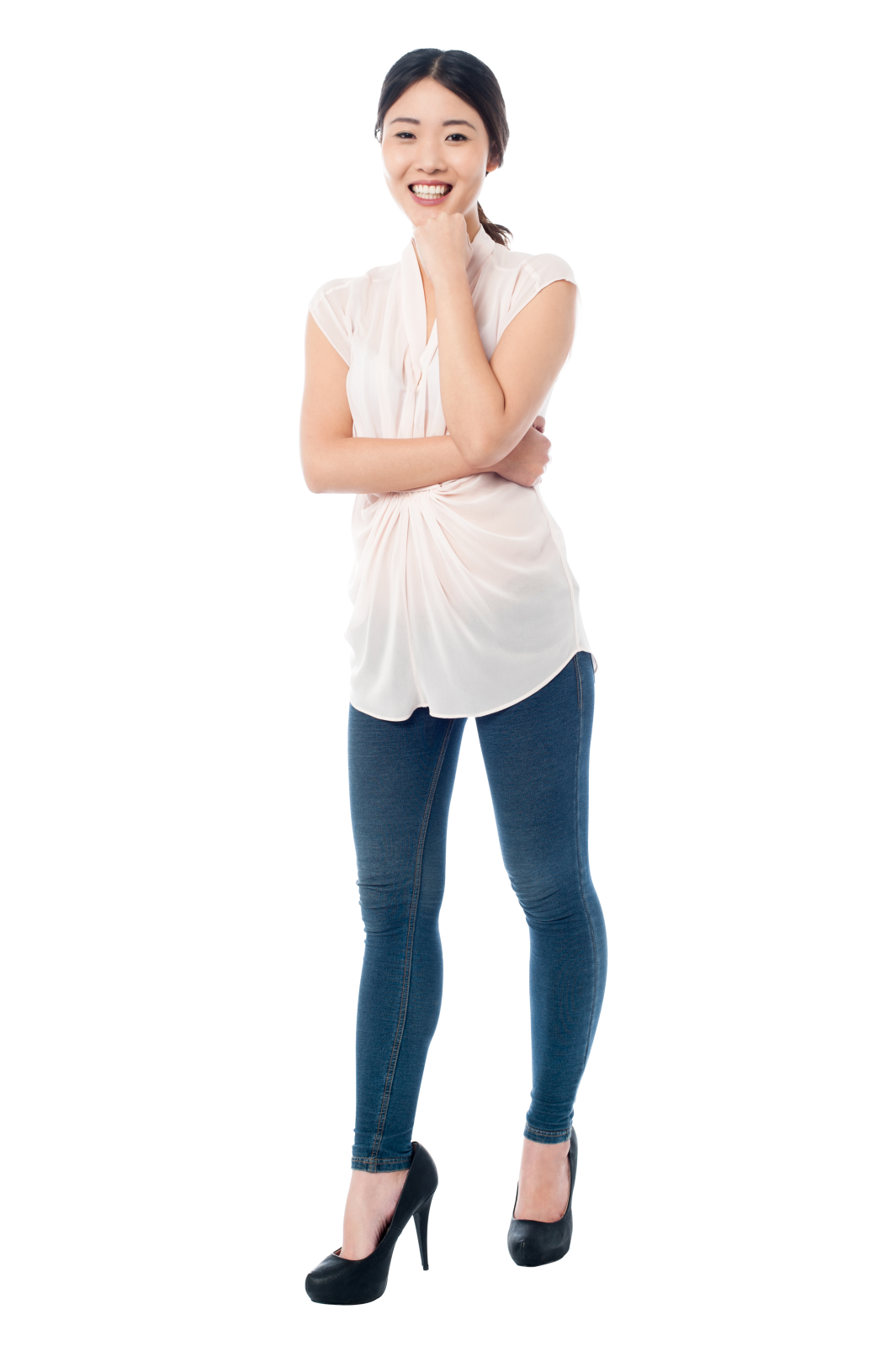 a woman standing with her arms crossed and looking at the camera