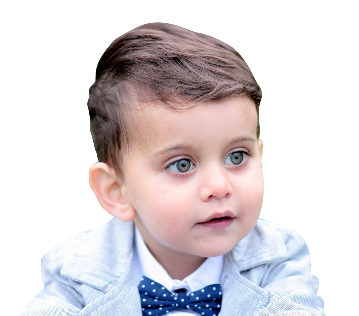 a little boy wearing a blue bow tie