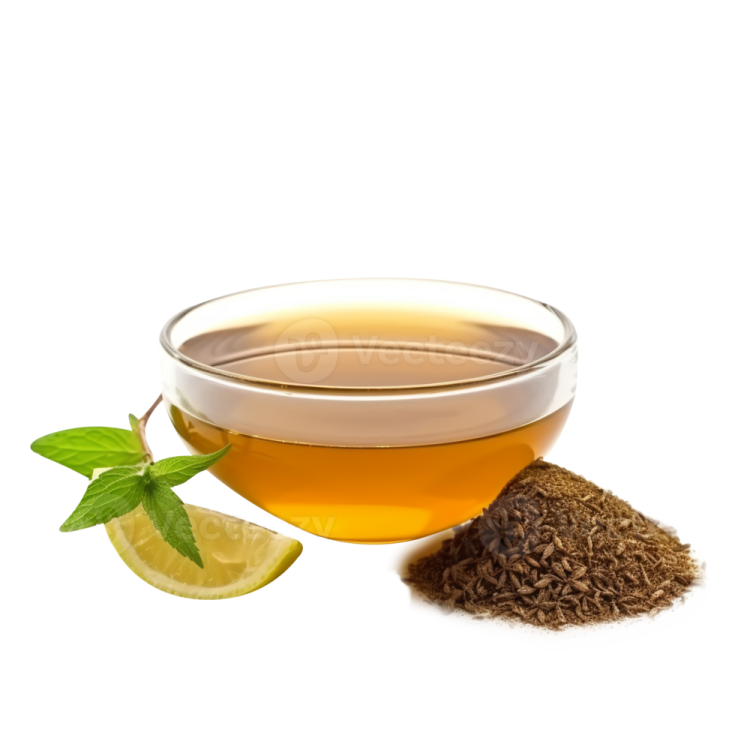a cup of green tea next to a lemon