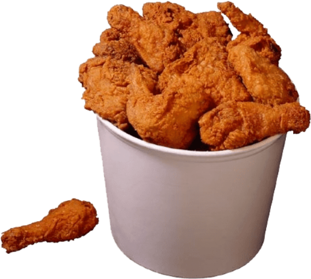 a white cup filled with fried chicken