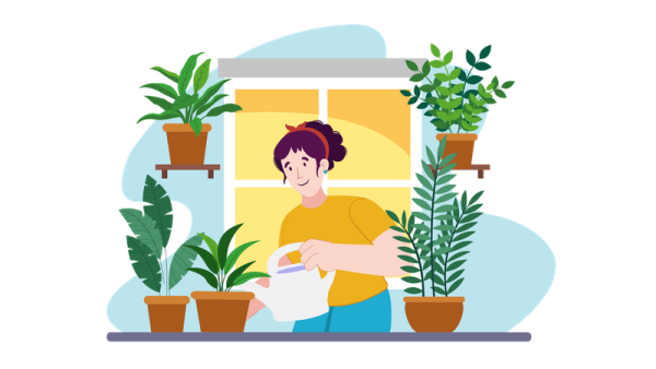 a woman sitting in front of a window with potted plants