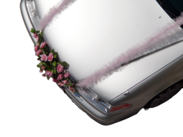 a silver car with pink flowers on the hood