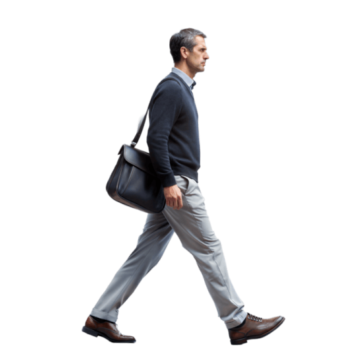 a man in a suit and tie walking with a briefcase
