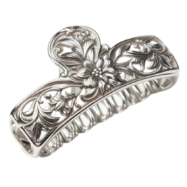 a silver ring with flowers on it