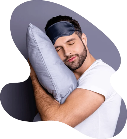 a man sleeping with his head on a pillow