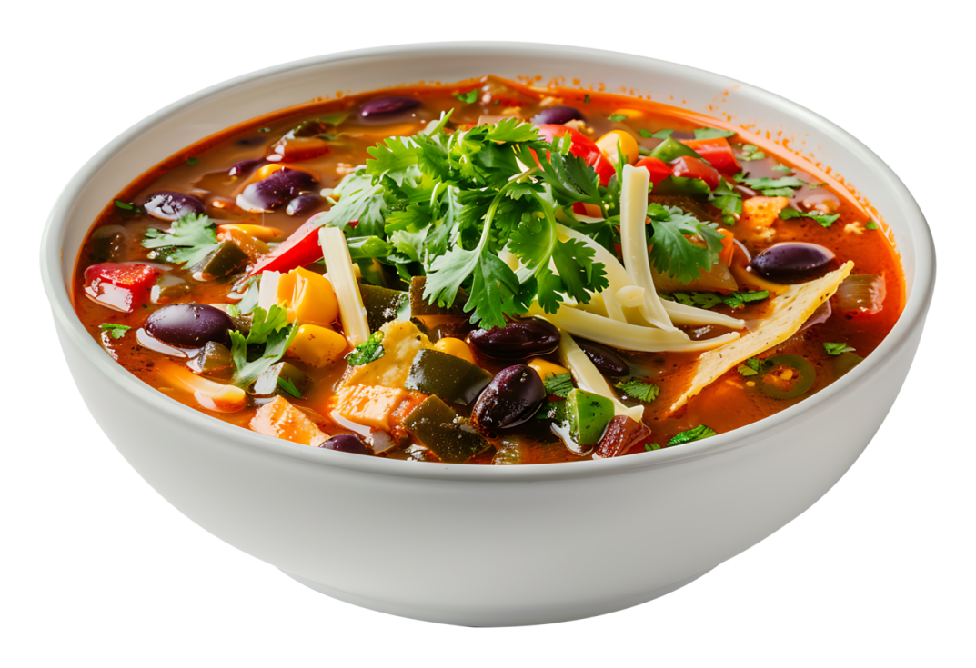 a white bowl filled with soup and vegetables