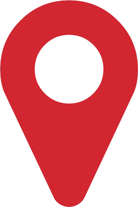 a red pin with a white circle on it
