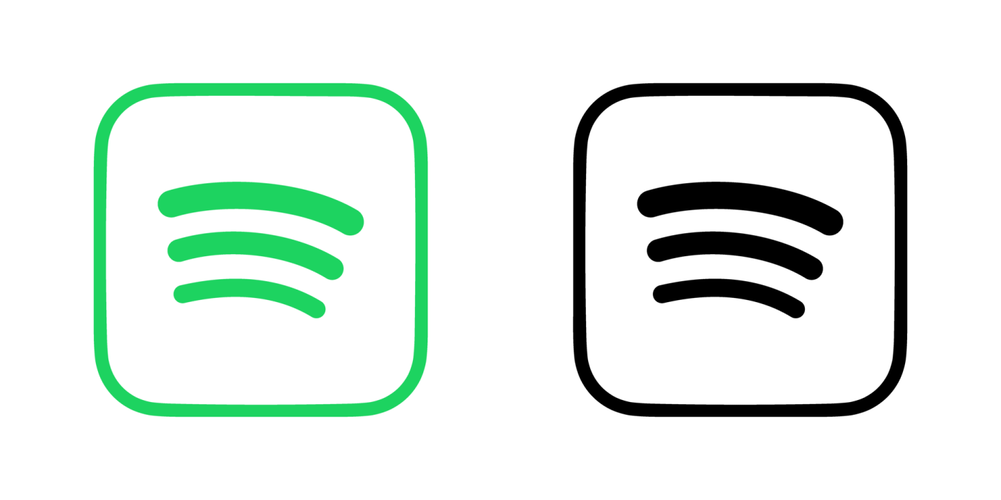 a green and black icon with two faces