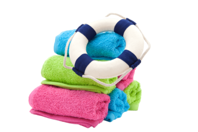 a pile of towels with a life ring on top