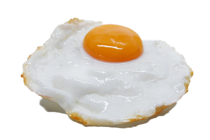 a fried egg on top of a white plate