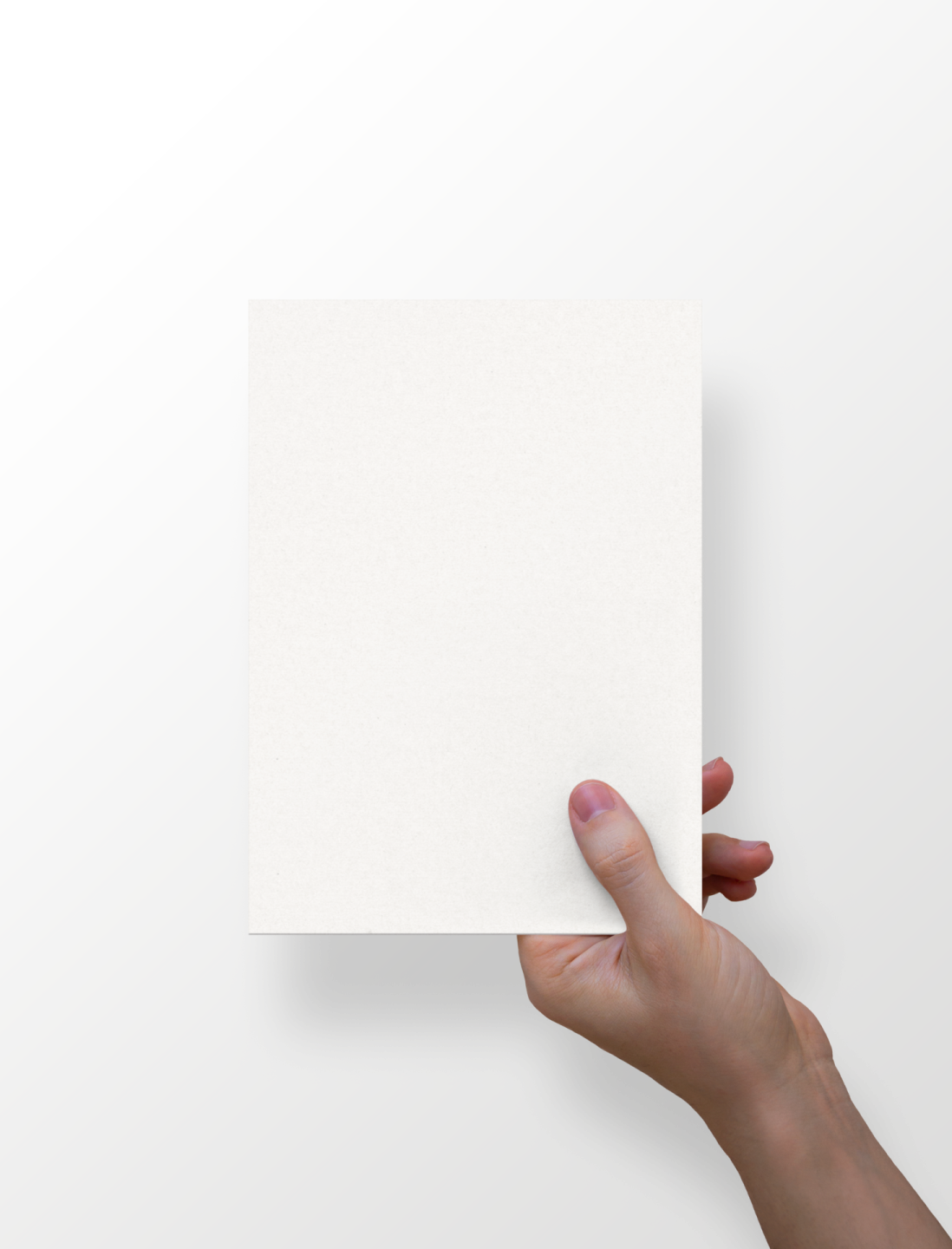 a hand holding a piece of paper