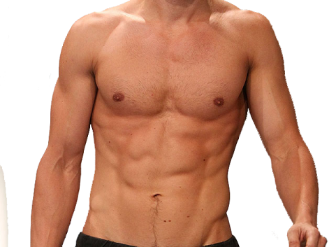 a man with no shirt standing next to a white wall