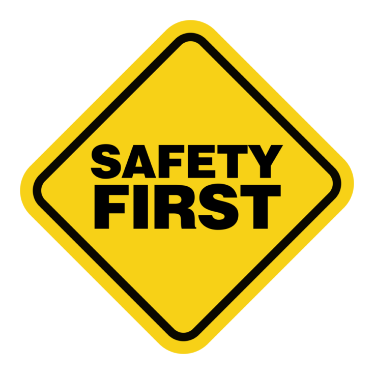 a yellow sign that says safety first