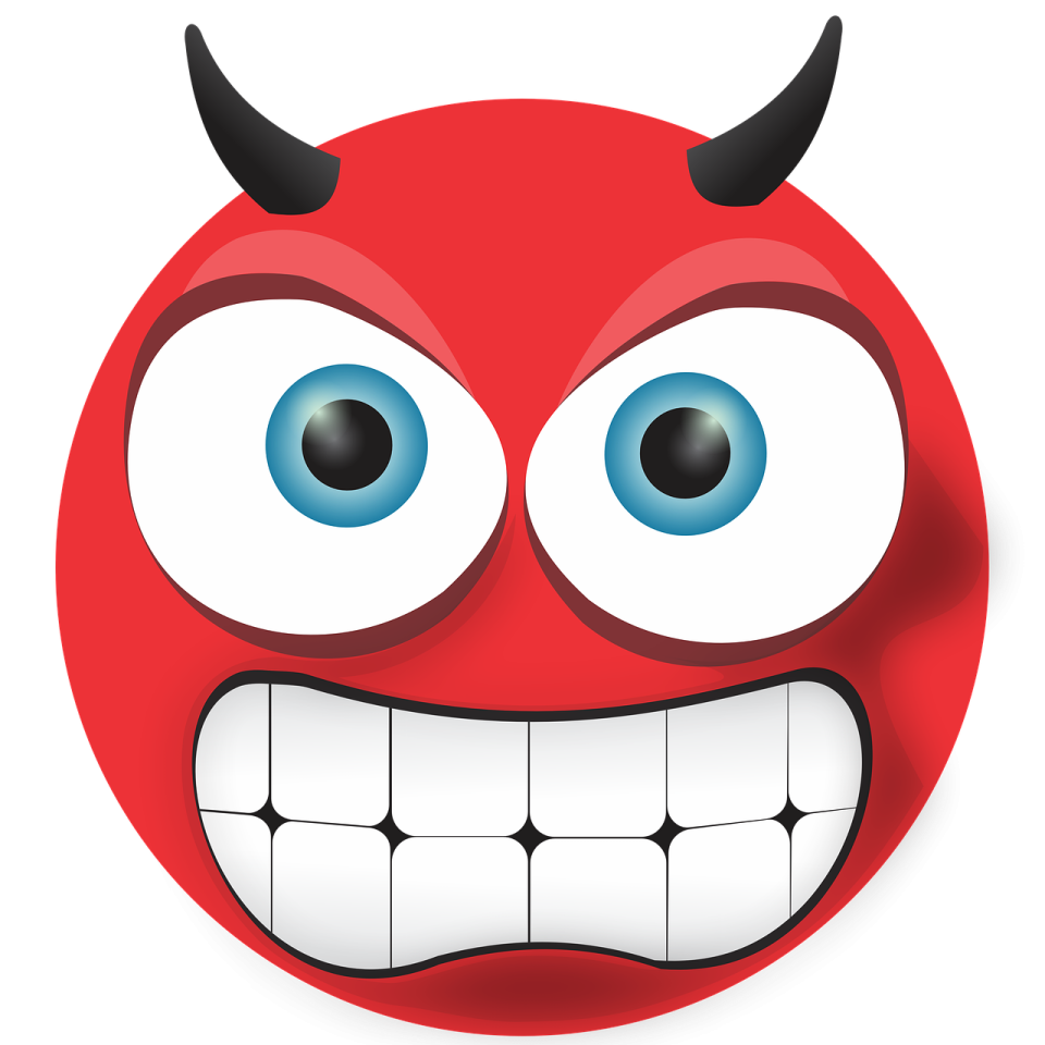 a red devil face with blue eyes and horns