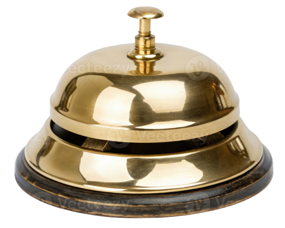 a brass bell on a white background