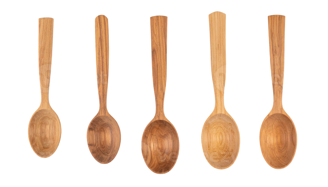 a set of four wooden spoons on a white background