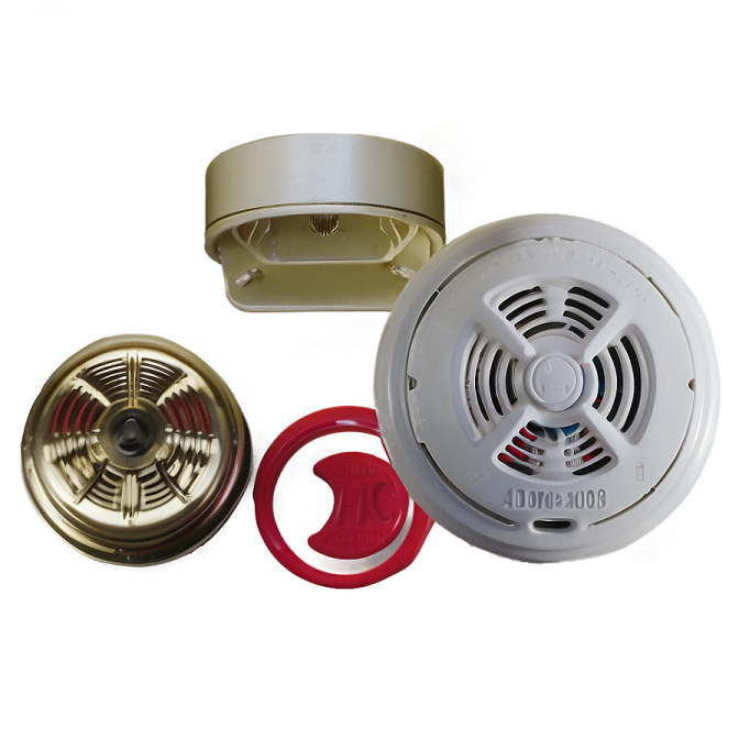 a white smoke detector and a red ring