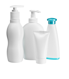 a set of three white bottles with blue caps