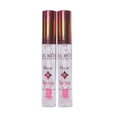a pair of sprays with pink liquid and gold cap