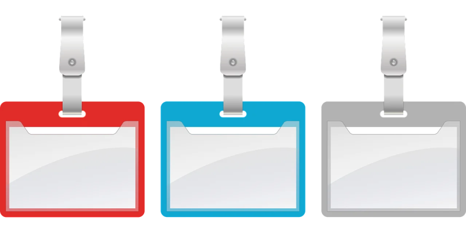 a set of three blank plastic identification cards