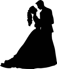 a silhouette of a bride and groom kissing