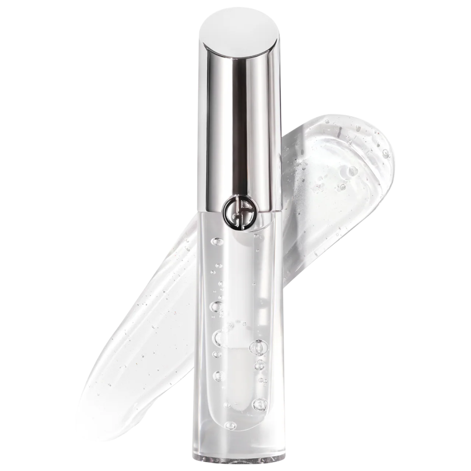 a bottle of white liquid with a silver cap on it