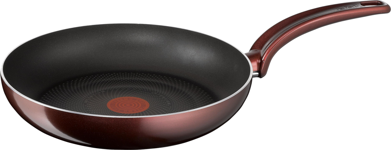 a frying pan with a red handle