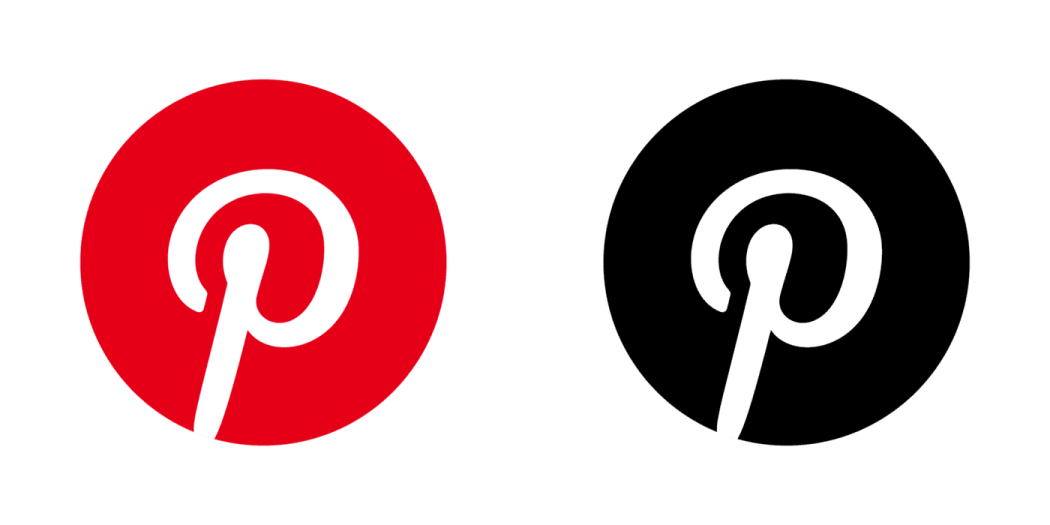 a black and red pin on a white background