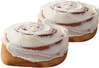 two cinnamon rolls on a white background