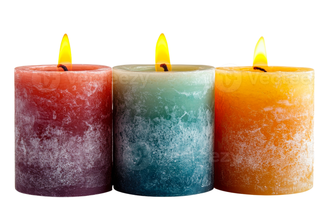 three colored candles on a white background