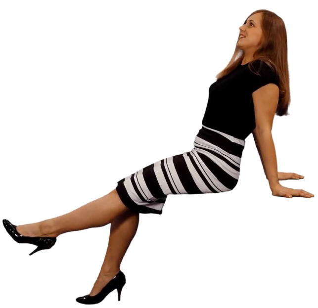 a woman is sitting on the floor with her legs crossed