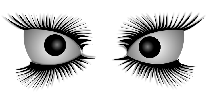 a pair of eyes with long eyelashes