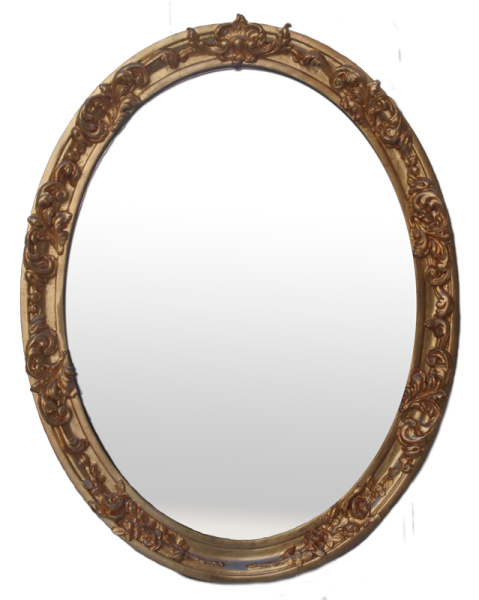 a round mirror with carvings on it