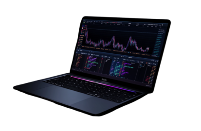 a laptop with an open screen showing a trading chart