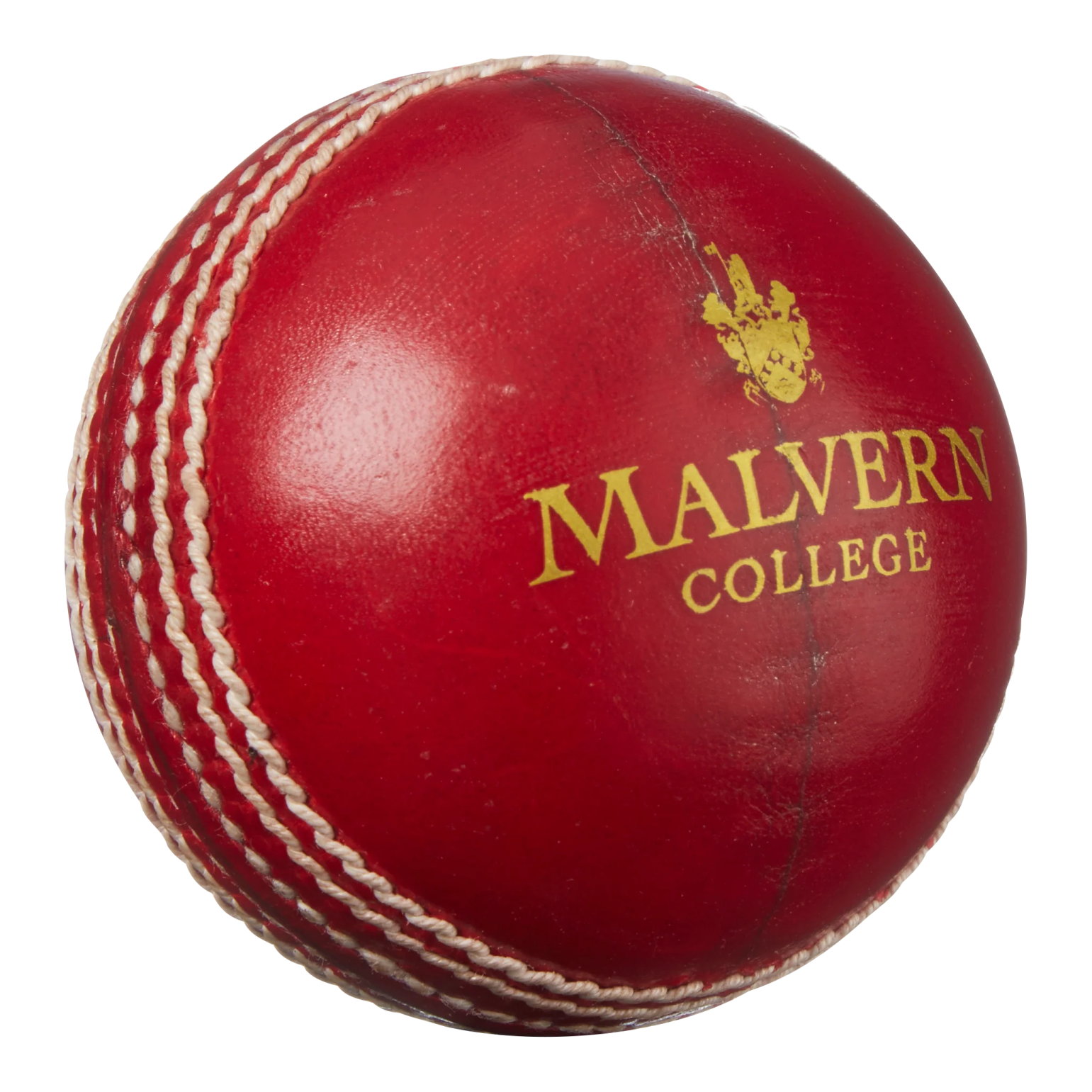 a red leather cricket ball on a white background