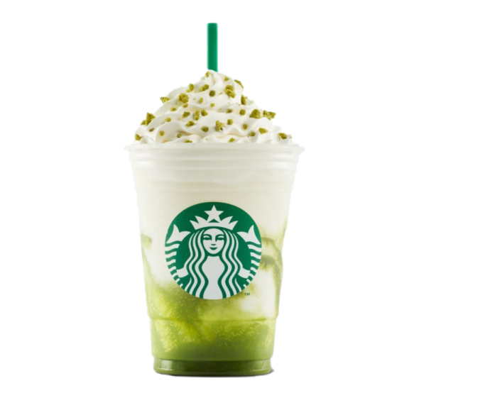 a starbucks cup with a green drink in it